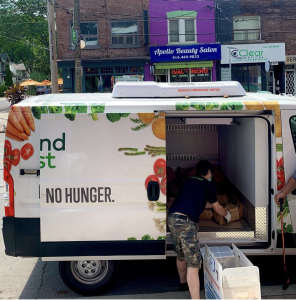 Daily Bread truck unloading. No hunger.